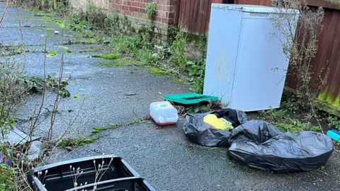 Alex Catt Fly tipped rubbish