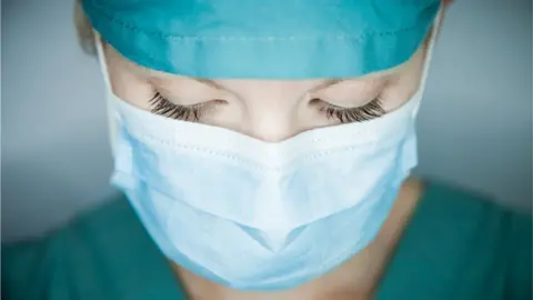 Getty stock image/aetb Nurse looking down - stock photo