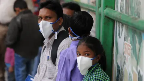 Getty Images N95 masks to patients with respiratory, lung disease and other high-risk patients at the civil hospital, on November 13, 2017 in Gurgaon, India.