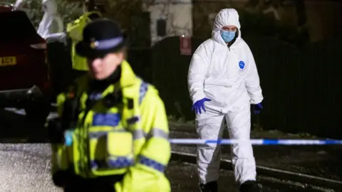 Getty Images Police in the street at Pentwyn, Penyrheol, Caerphilly