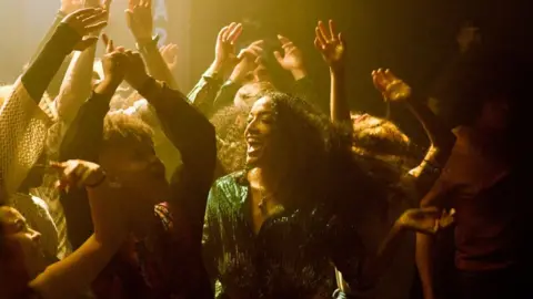 Getty Images People enjoying a gig