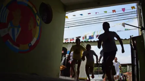 Getty Images Children playing in Rio