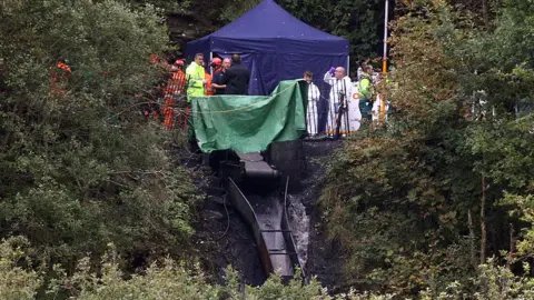 Matt Cardy/Getty Images  Emergency workers after the Gleision mine flooding