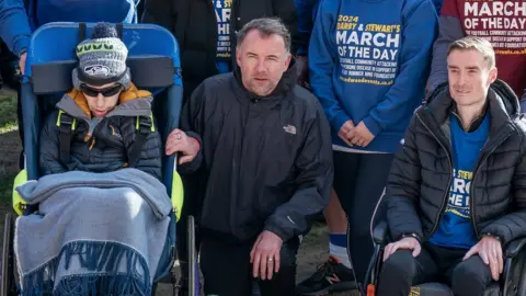 PA Media Former rugby player Rob Burrow with former football players Marcus Stewart and Stephen Darby, who have all been diagnosed with motor neurone disease