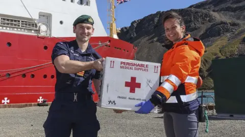 LPhot Belinda Alker Vaccines handed over from sailor to scientist