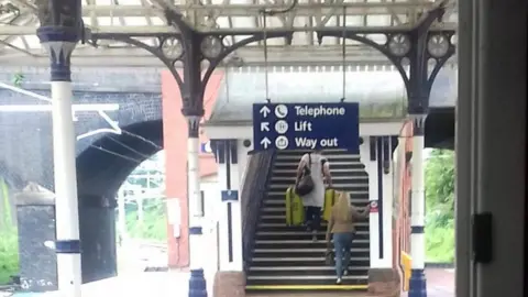 People leaving Poulton Railway station after yet another airport train cancelled