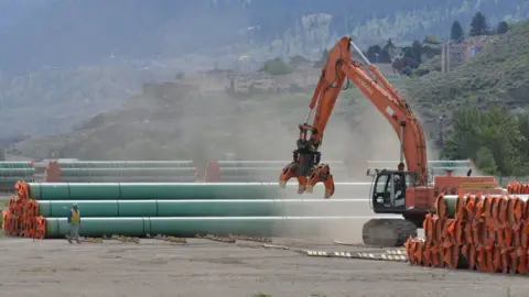 Reuters Steel pipe to be used for the Trans Mountain Expansion Project at a stockpile site in British Columbia.