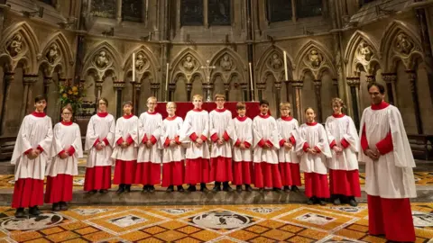 Nordin Ćatić Andrew Nethsingha, Director of Music, with the choristers a few weeks before this year's Advent Carol Service
