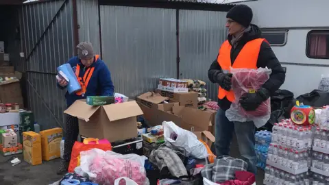 Charlotte Hobson and Gavin Knight Gavin volunteering