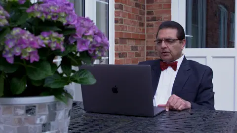 BBC Dr Akhtar connects via video link from his home in Essex