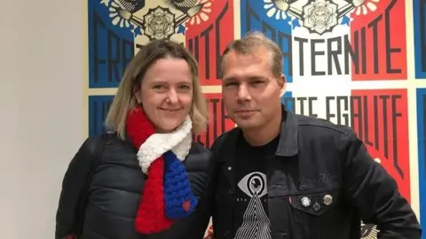 Theresa Cede Theresa Cede with Shepard Fairey in front of his artwork Liberté, Egalité, Fraternité as an homage to all the victims of the November 13 attacks