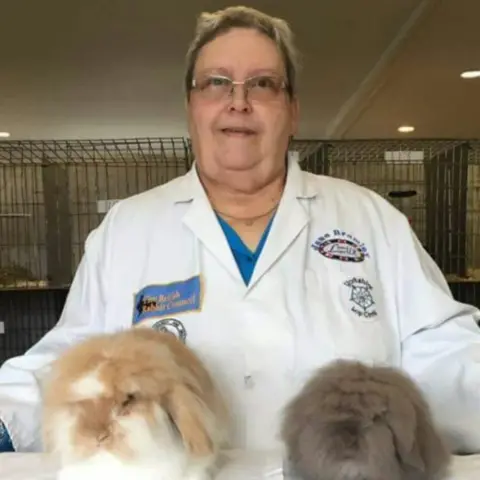 Jane Bramley Jane with two of her rabbits, Spencer and Geneva