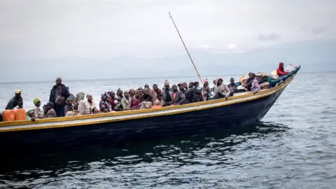 AFP People on a boat on Lake Kivu fleeing Goma, DR Congo - Thursday 27 May 2021