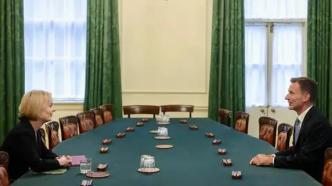 UK Government Liz Truss and Jeremy Hunt sit opposite each other at the Cabinet table