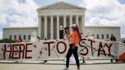 Reuters DACA recipients and their supporters celebrate outside the U.S. Supreme Court after the court ruled in a 5-4 vote that U.S. President Donald Trump's 2017 move to rescind the Deferred Action for Childhood Arrivals (DACA) program, created in 2012 by his Democratic predecessor Barack Obama, was unlawful, in Washington, US, 18 June 2020