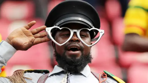 Reuters A Malian fan saluting in a stadium in Limbe, Cameroon - Sunday 16 January 2022