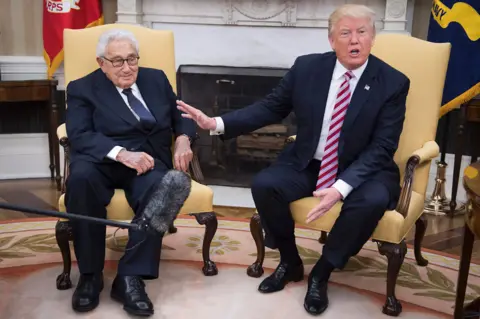 Getty Images Henry Kissinger and Donald Trump in the Oval Office in May 2017