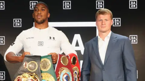 Getty Images Anthony Joshua and Alexander Povetki