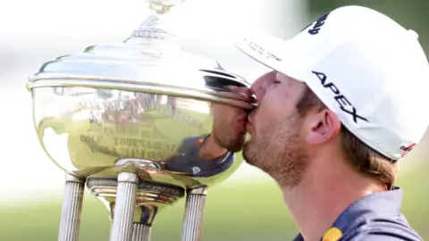 Sam Burns with trophy