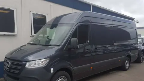 Dr Feelgood The Mercedes Sprinter van parked on a driveway