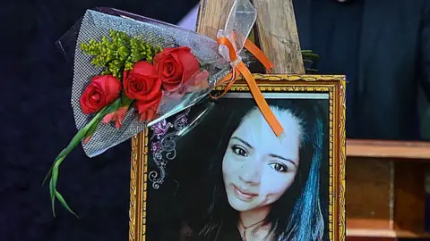 AFP View of a picture of Nurse Keyla Martinez during her funeral in La Esperanza, Honduras, on February 9, 2021