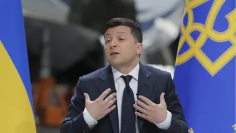 EPA Ukrainian President Volodymyr Zelensky speaks during a press conference at the Antonov aircraft plant in Kiev, Ukraine, 20 May 2021