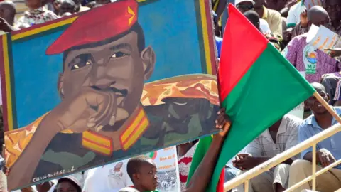 AFP A poster of Burkina Faso's former leader Thomas Sankara