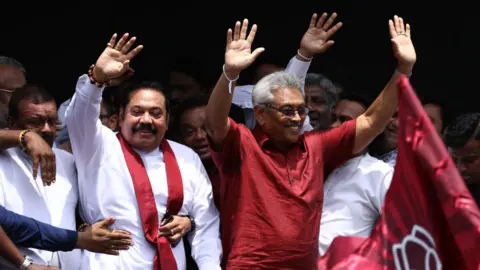 NurPhoto via Getty Images Elder brother and former president Mahinda (left) was a big part of Gotabhaya's election campaigning