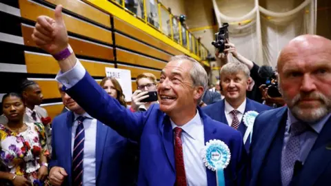 Reuters Nigel Farage gives a thumbs up after winning the Clacton seat