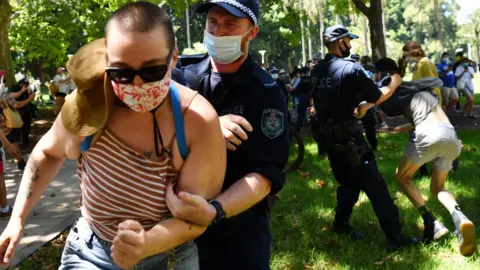 EPA A number of protesters are arrested by police as a small group marched through Hyde Park