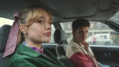 Samuel Taylor/Netflix  Aimee Lou Wood as Aimee, Asa Butterfield as Otis in Sex Education