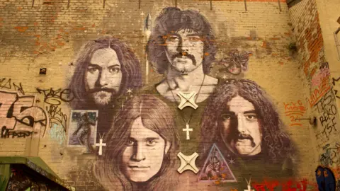 John Bray Mural showing the faces of Black Sabbath members
