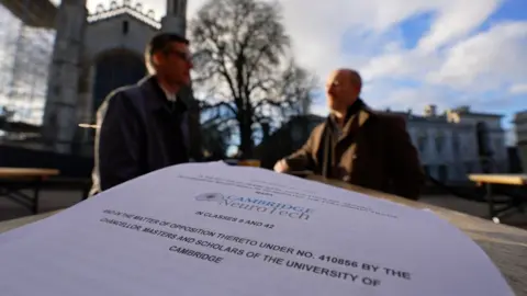 Steve Hubbard/BBC Paperwork from Cambridge NeuroTech's trademark battle