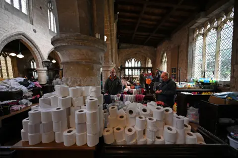 Getty Images Supplies piled up in the church