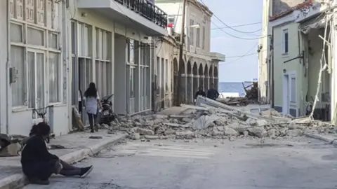 Getty Images People assess the damage on Samos, Greece. Photo: 30 October 2020