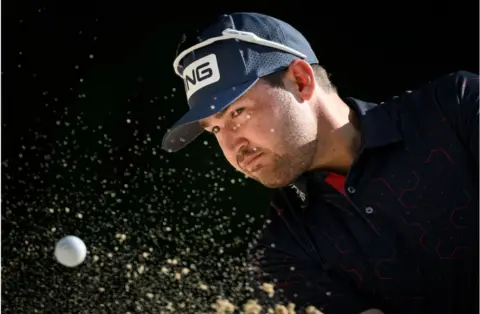 AFP Thriston Lawrence with his eyes intently on the ball.