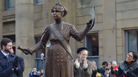 Neil Smith Maxine Peake and Oldham MPs applaud at unveiling of Annie Kenney statue