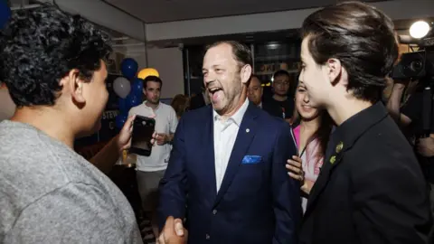 Getty Images Don Stewart shakes hands with supporters