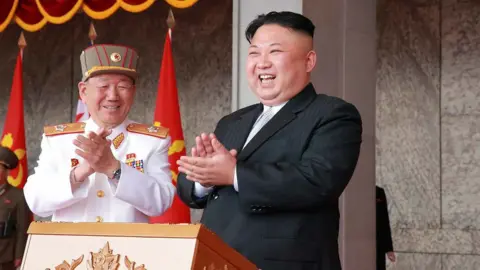 Getty Images Kim Jong-un at a military parade