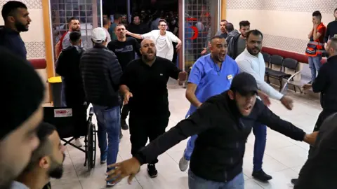 EPA-EFE Palestinians at hospital in Nablus (25/10/22)