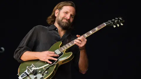 Getty Images Bradley Cooper performs at the UK's Glastonbury music festival