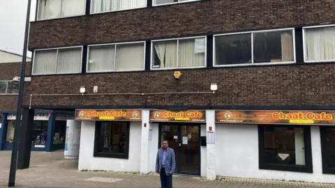 Pradeep Bhardwaj outside building