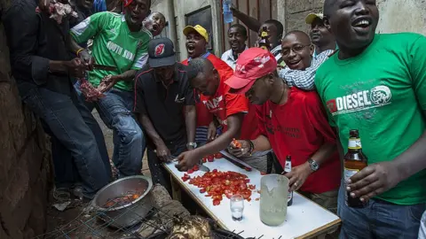 AFP People in Nairobi preparing a meat barbecue