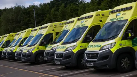 Reuters A row of West Midlands Ambulances