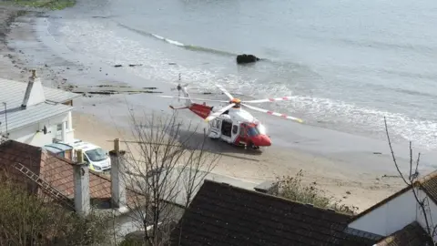 A rescue helicopter on Kinghorn Beach