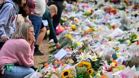 EPA/WILLIAM CONRAN Floral tributes left at Sandringham