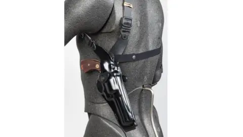 Metropolitan Police A computer-generated image of a torso with a holster under the left armpit with a revolver in it