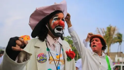 EPA People dressed as clowns protest on the main avenues in Acapulco, Guerrero, Mexico, 07 May 2018.