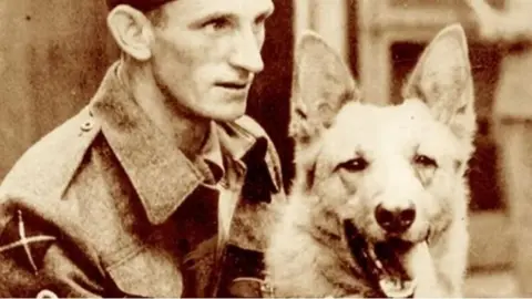 MOD Khan, the German Shepherd who served in the British Army during WWWII with his handler Jimmy Muldoon