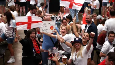 Reuters Fans arrive at Boxpark, Wembley